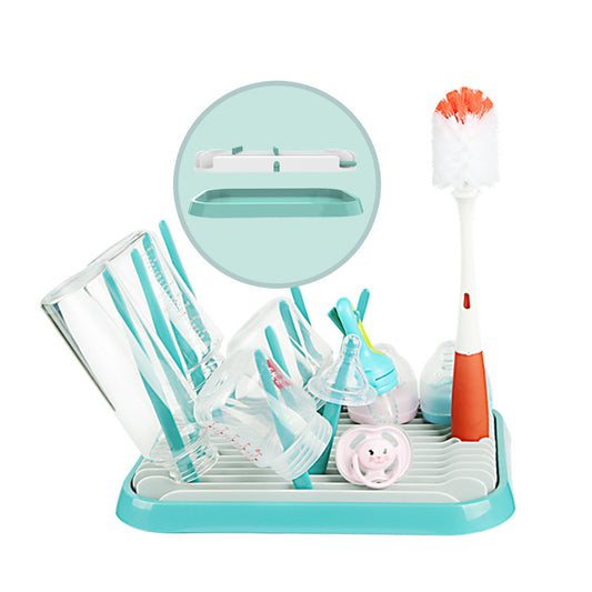 Baby bottle drying rack with bottles, pacifier, and cleaning brush on drainer tray - IZZIE